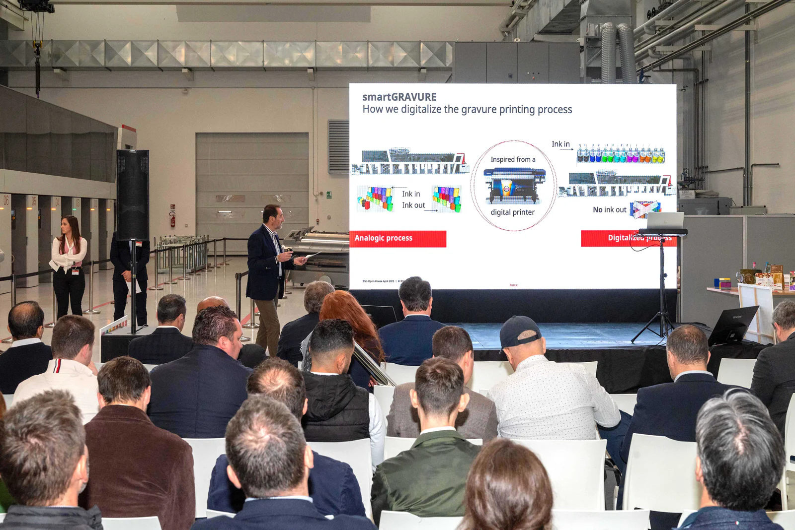 The picture shows Davide Rosello explaining a system to many people