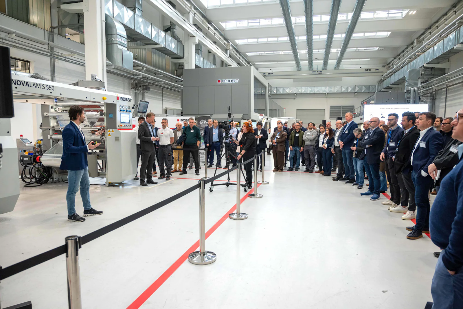 The picture shows a person presenting the new system